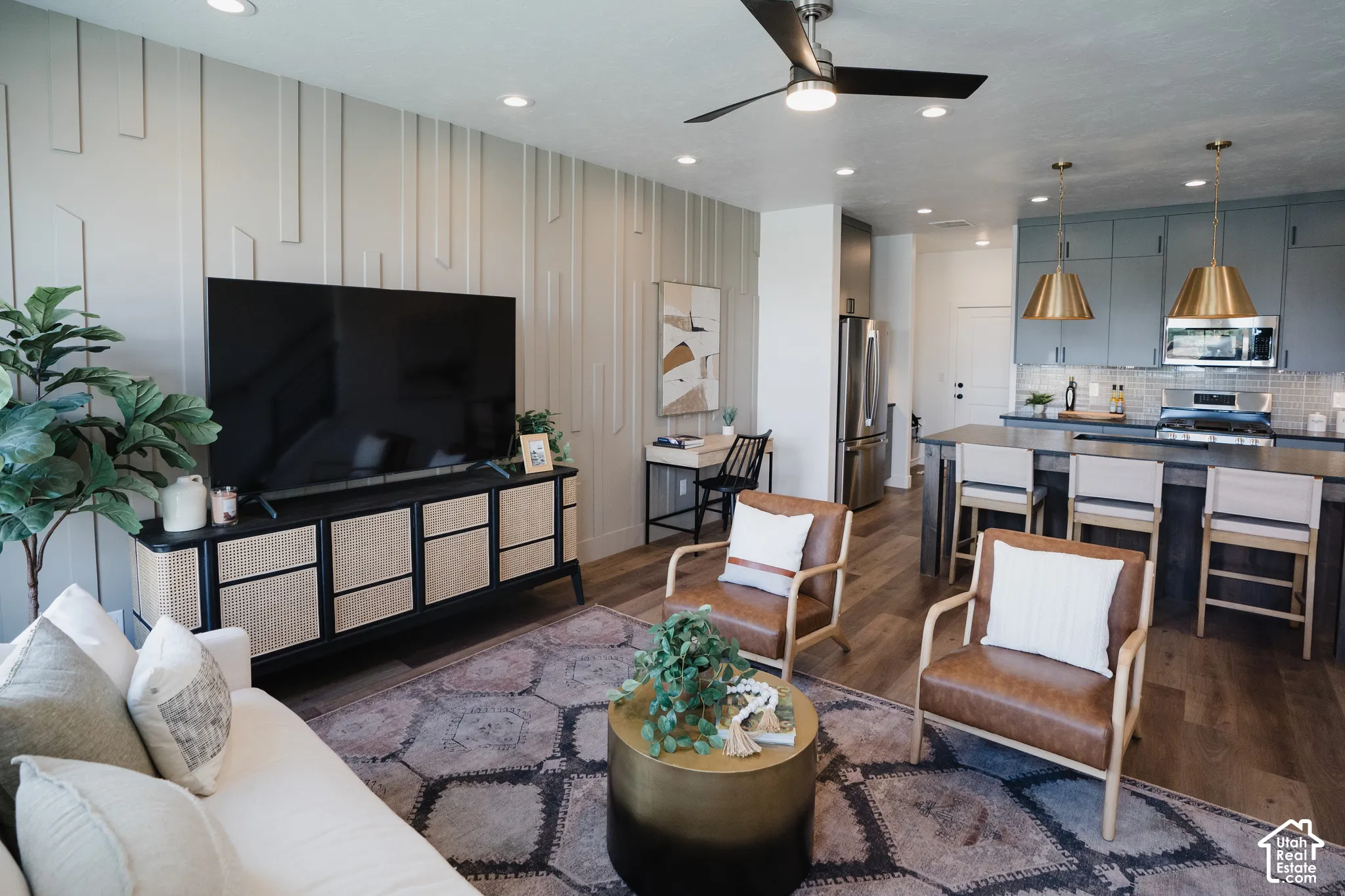 Wood-finish flooring, recessed lighting, and a ceiling fan