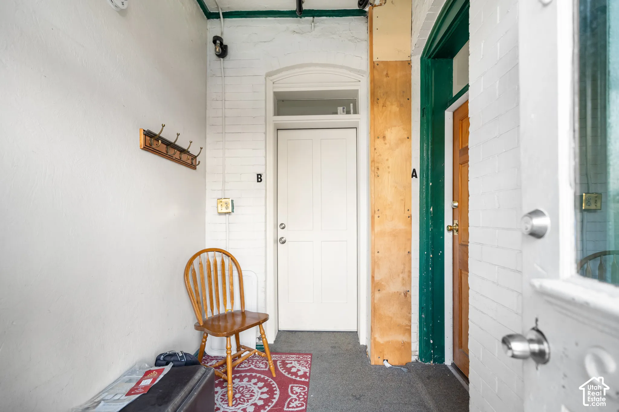 Arch-top entry door with transom window