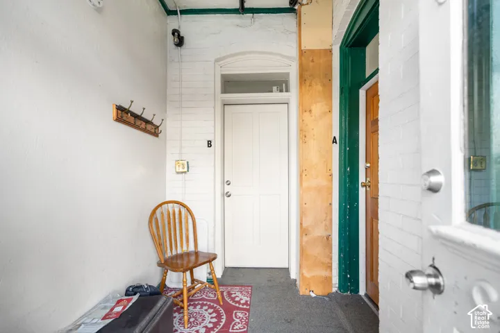 Arch-top entry door with transom window