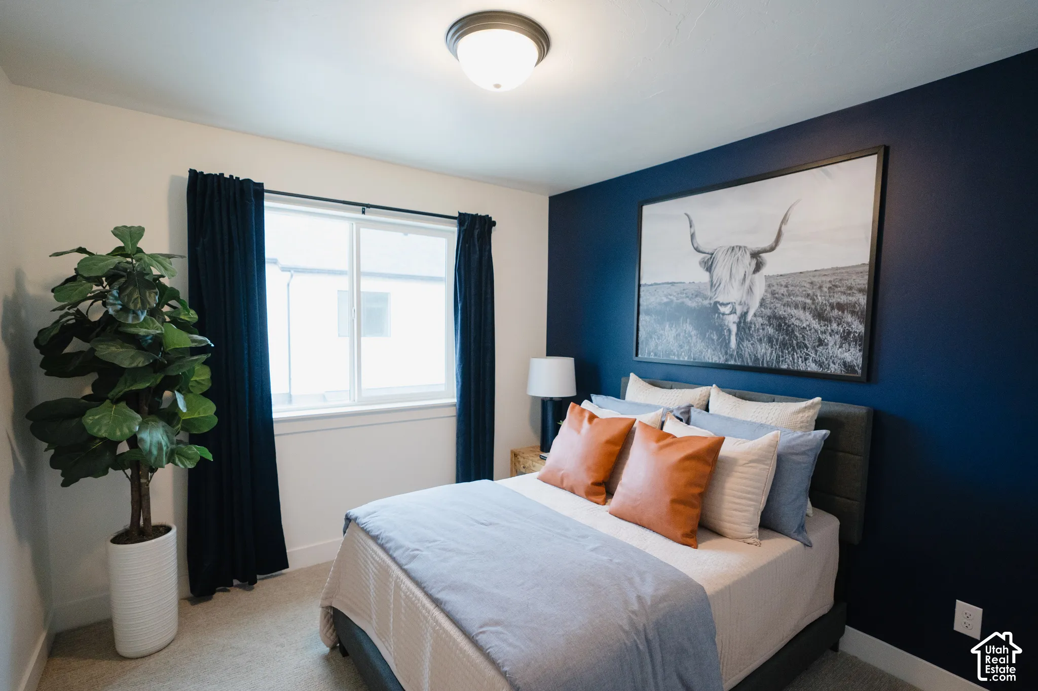 Recessed window with white trim, wall-to-wall carpeting, and a flush mount ceiling light