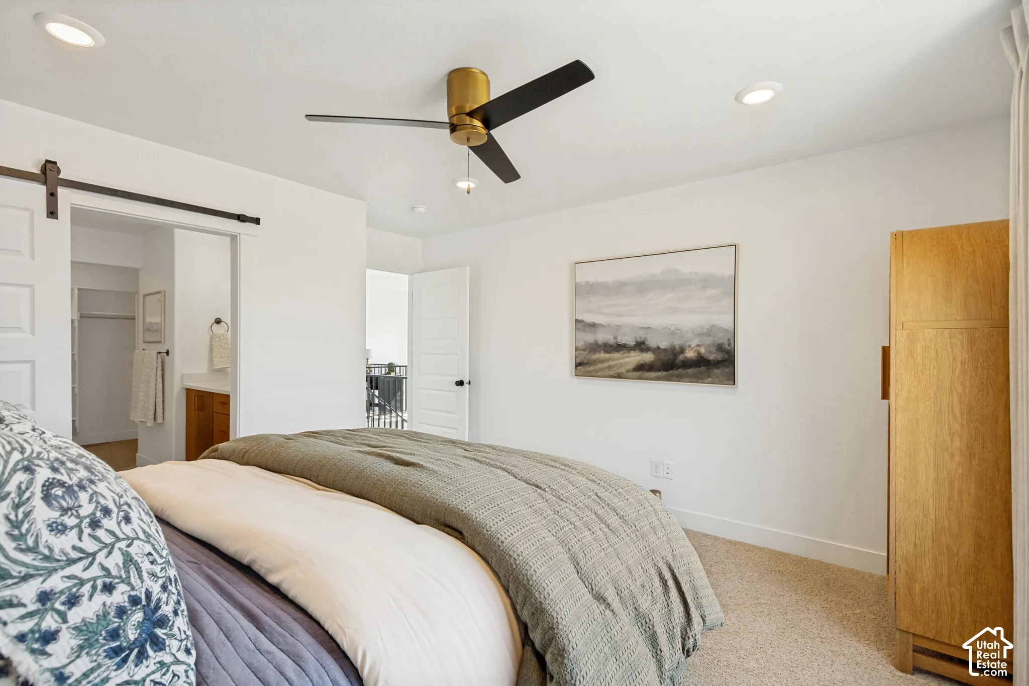White walls and carpeted flooring