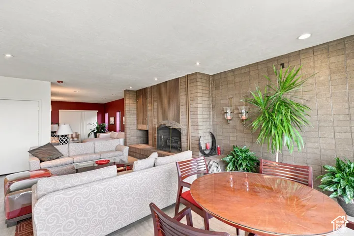 Brick accent wall with wood paneling