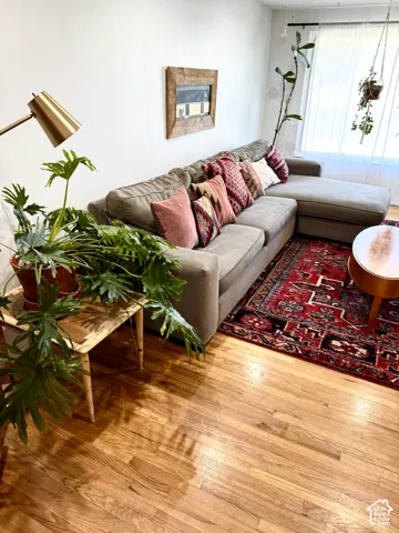 Hardwood flooring throughout the space