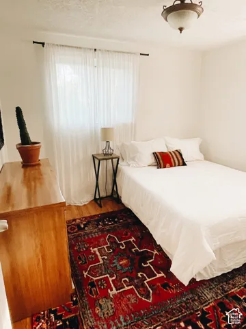 Cozy Bedroom 3White walls featuring a single window