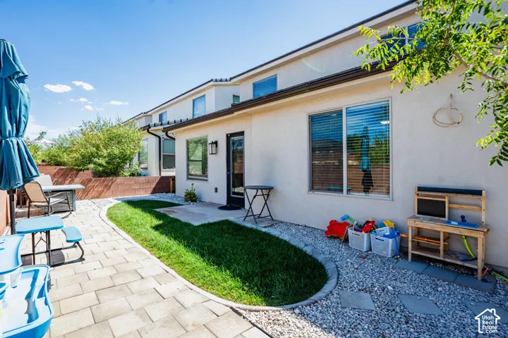 Stucco exterior with multiple windows