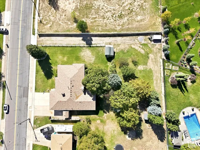 Expansive parcel with mature trees and a substantial grass area