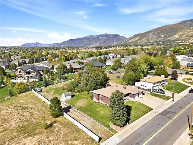 Expansive suburban neighborhood with mountain backdrop