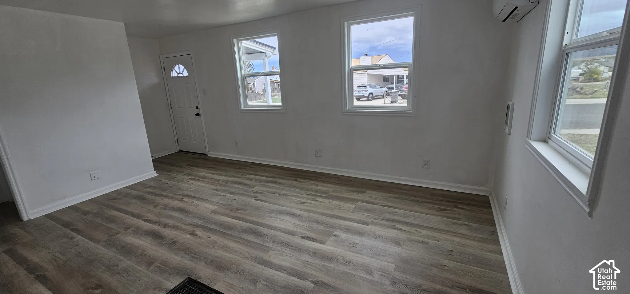 Wood-finish flooring throughout