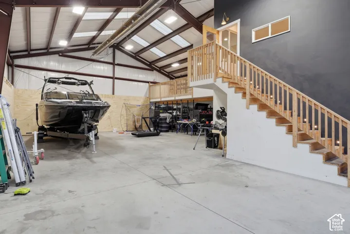 Spacious interior with high ceilings and exposed structural beams