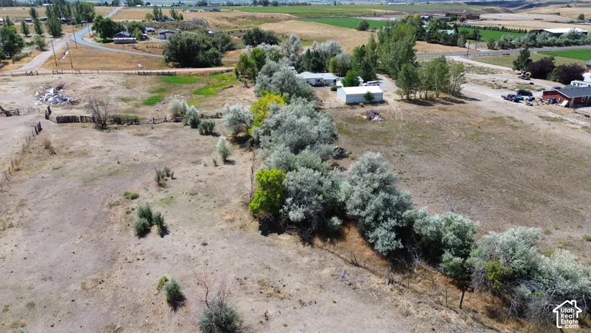 Expansive undeveloped land featuring natural terrain and varied foliage