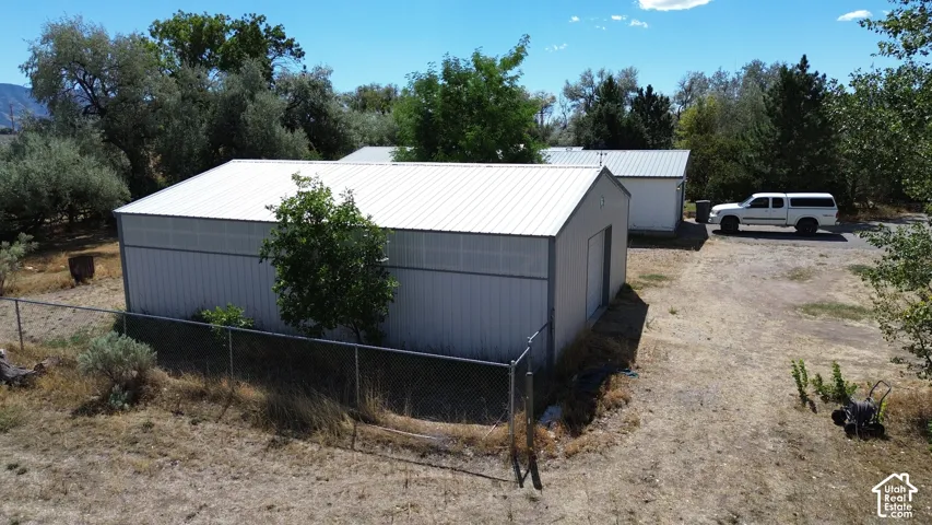 Multiple utility buildings with metal roofing and siding