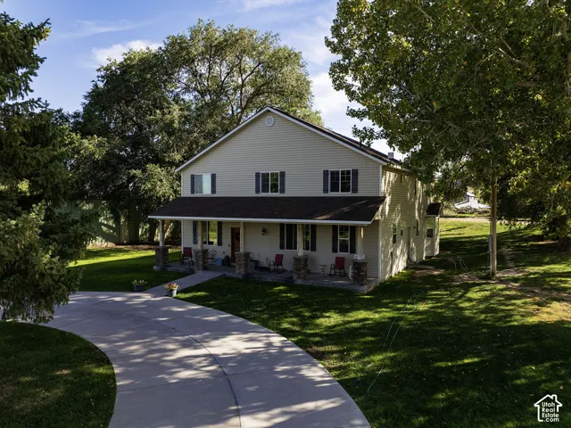 Two-story exterior with light-colored siding