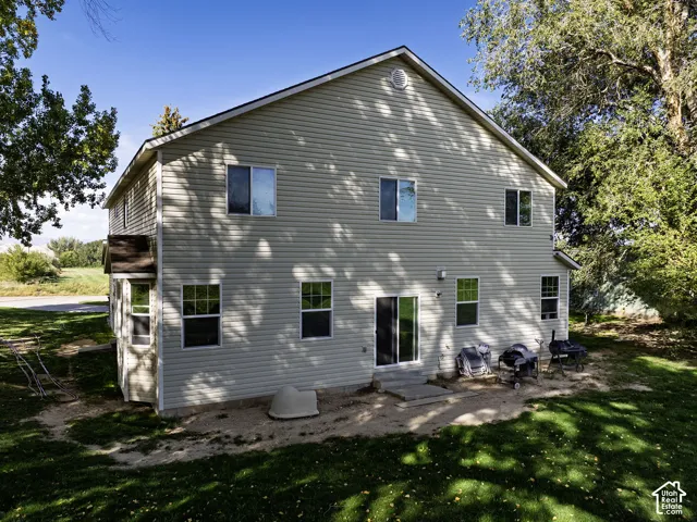 Two-story exterior with light-colored siding