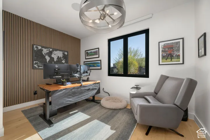 Accent wall featuring vertical wood paneling