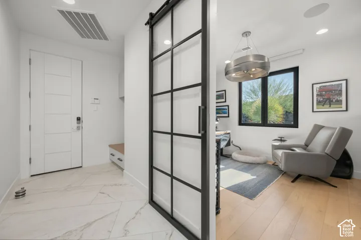 White paneled door with smart lock entry