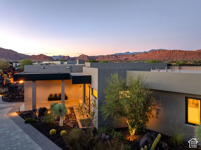 Modern exterior architecture featuring a flat roofline and dark-framed windows