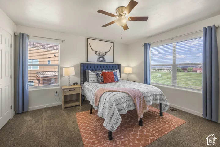 White walls with brown carpet flooring