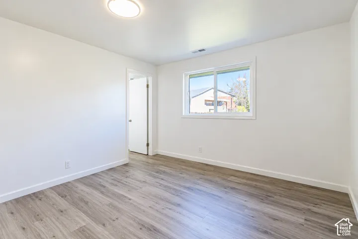 Primary Bedroom - New LVP Floor and Paint - No Decor