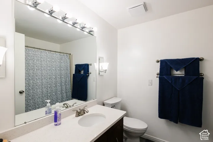 Bathroom #2 - New Sink, Faucet, and Quartz Countertop. New LVP Floor and Paint