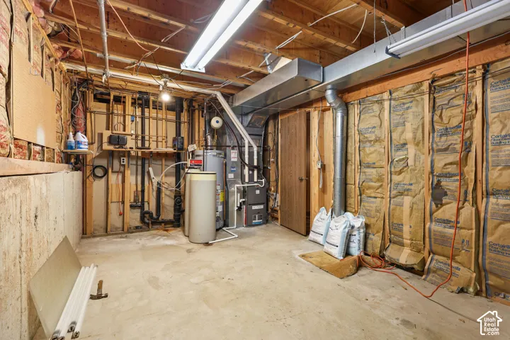 Exposed wood framing and concrete flooring