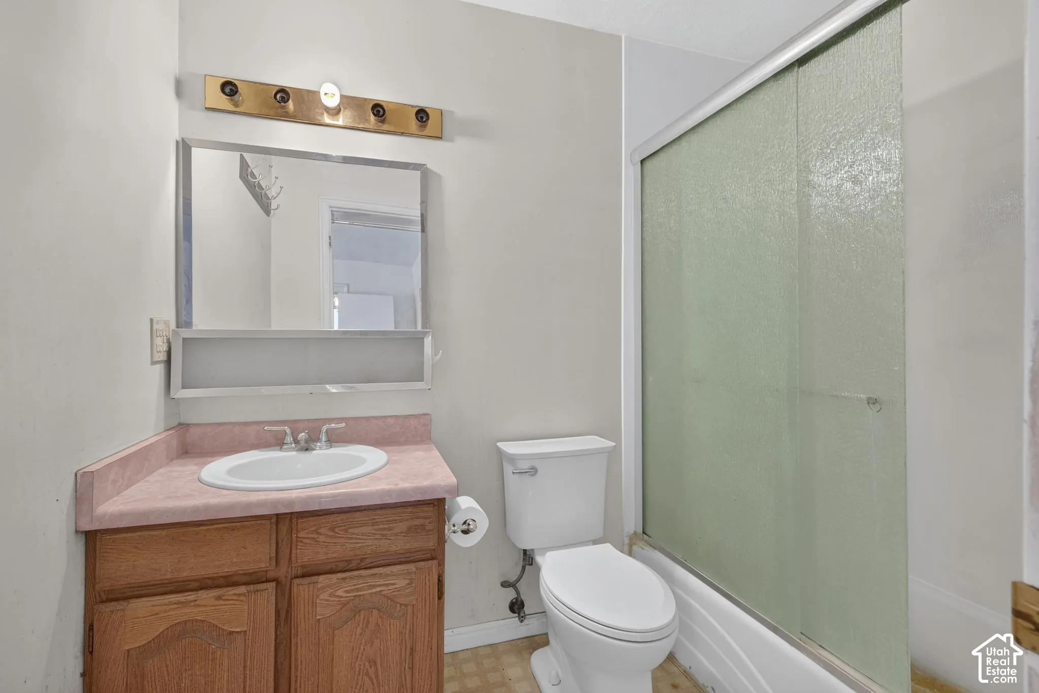 Bathroom attached to front (South) bedroom.