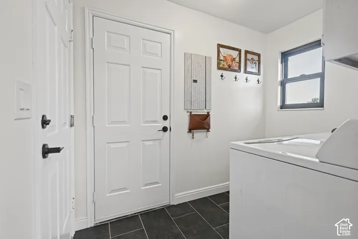 White paneled door with matte black hardware