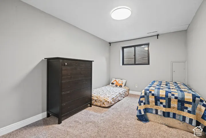 Recessed window with dark framing and privacy blinds