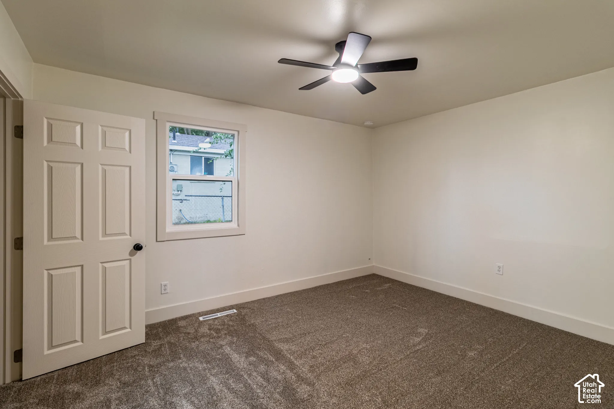 Neutral wall tones complemented by textured carpeting