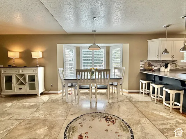 Floor features large format tile