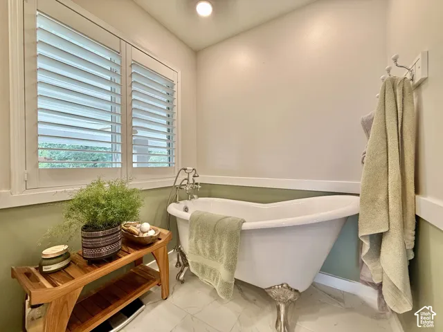 White plantation shutters over window