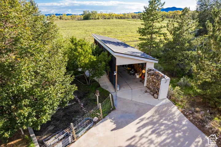 Carport structure with a sloped roof