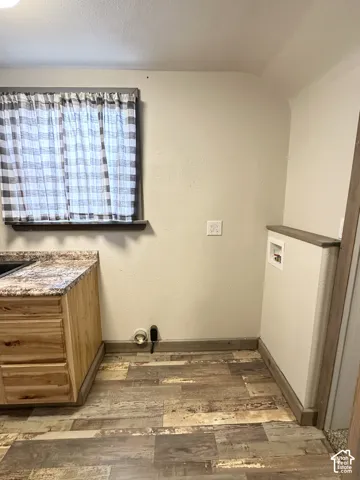 Wood-finish flooring with a varied plank design