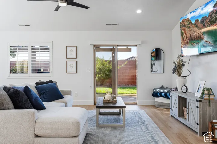 Recessed lighting, ceiling fan, wood-finish flooring, sliding glass door, plantation shutters