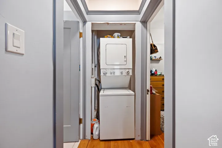 Stackable laundry appliances within a dedicated utility closet