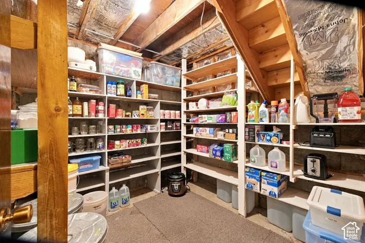 Extensive built-in shelving provides ample storage