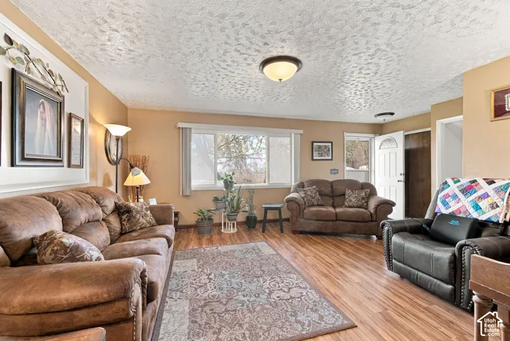 Wood-finish flooring throughout, complemented by neutral wall tones
