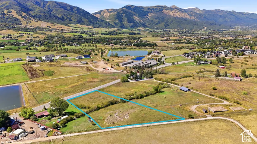 Expansive undeveloped land parcels with natural ground cover