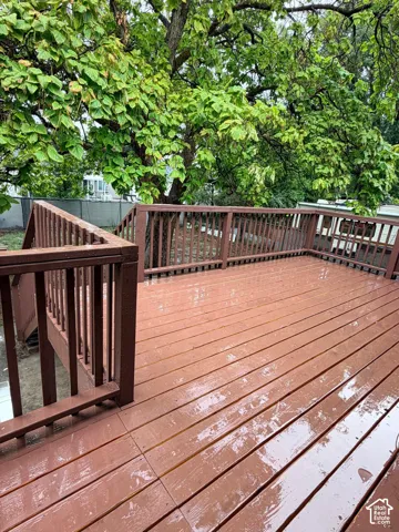 Spacious outdoor deck with a rich brown finish