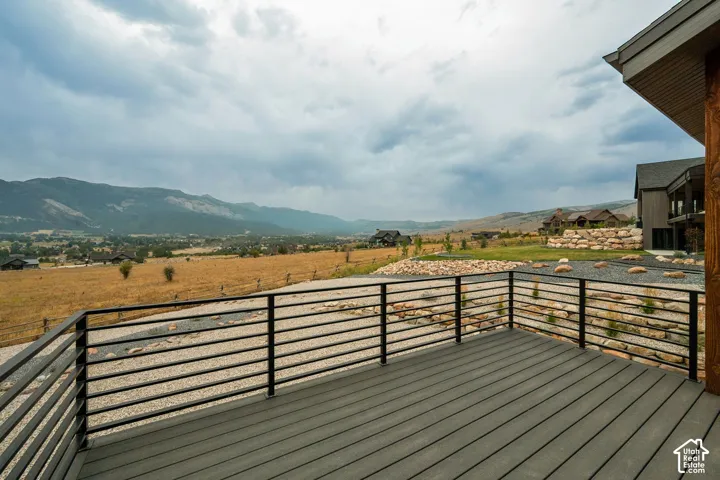 Deck with composite decking and metal horizontal railings