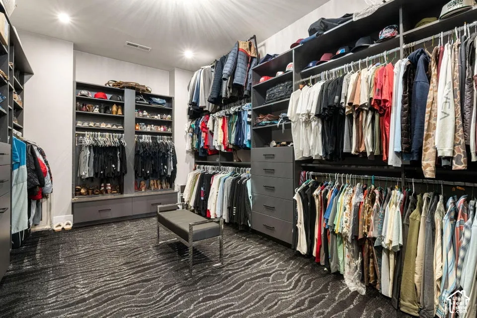 Custom-built closet system with extensive hanging space and integrated shelving