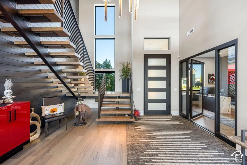 Two-story foyer with wood-finish flooring