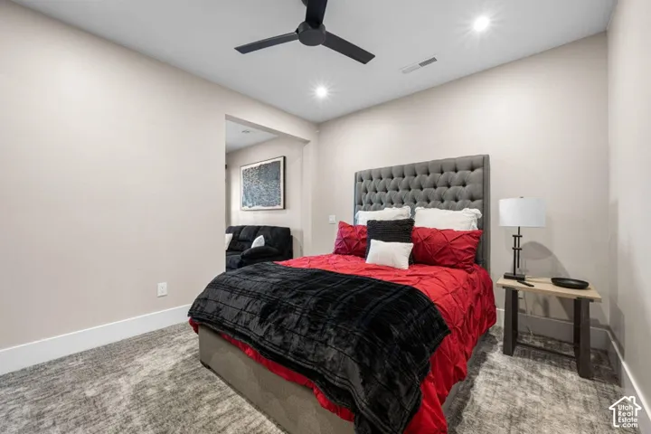 Recessed lighting, ceiling fan, and carpet flooring