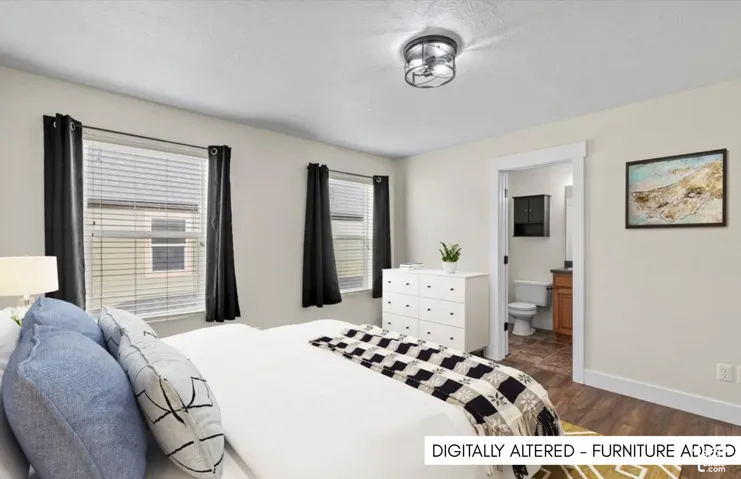 Recessed ceiling fixture with a dark metal frame