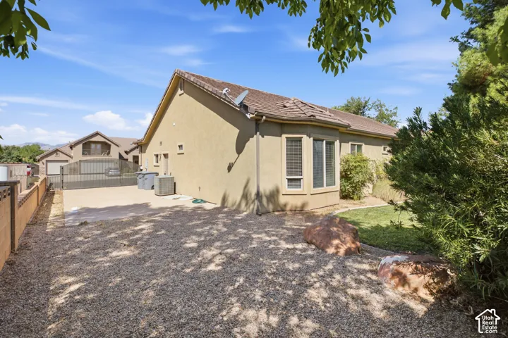 Exterior stucco finish with a tiled roof