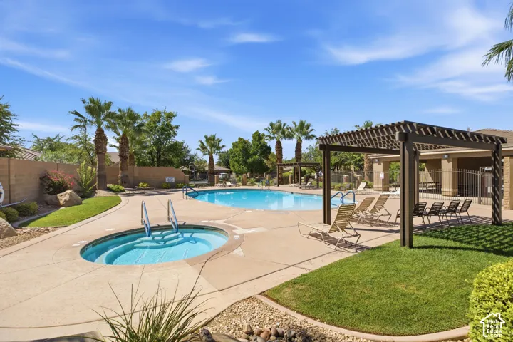 Outdoor pool and spa with concrete surround