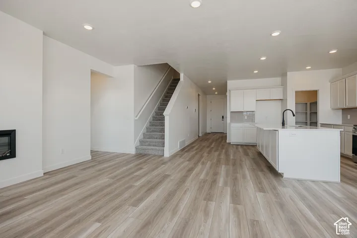 Wood-finish flooring throughout the main level