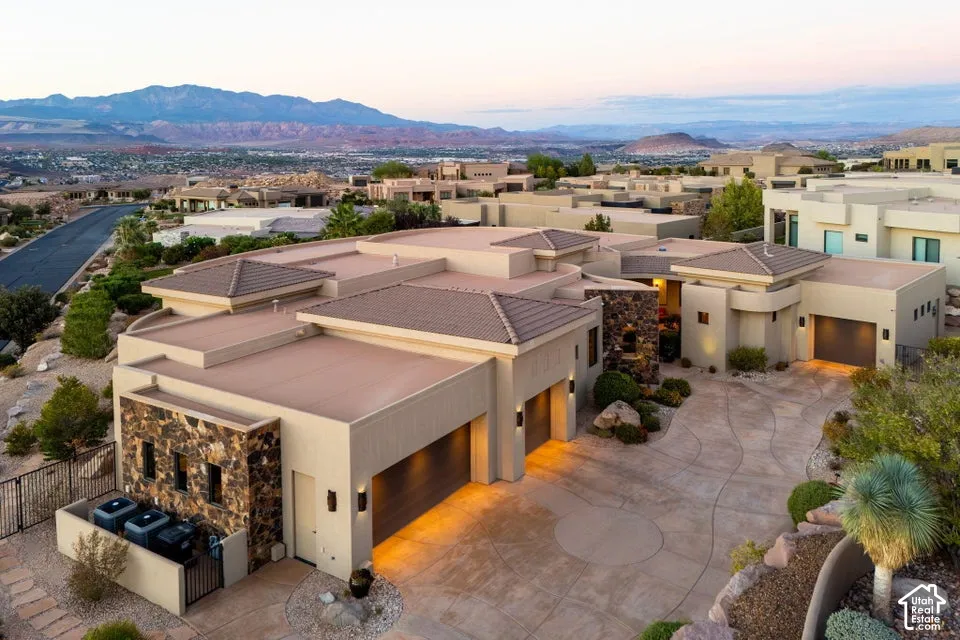 Modern desert architecture with stone accents and a flat roof design