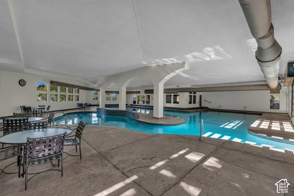 Indoor swimming pool with concrete decking