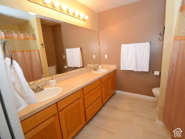 Primary bath dual vanity with pleanty of counter and mirror space.