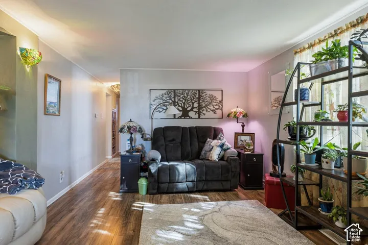 Wood-finish flooring throughout, complemented by light-toned walls